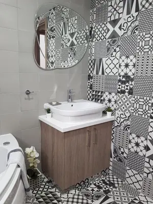 a bathroom with a sink and a mirror at Evmelia Kakopetria Suites in Kakopetria