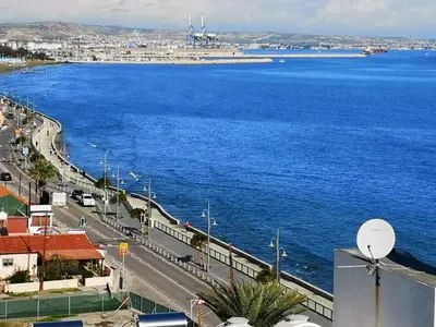 a view of a city and the ocean at Sea View Holiday Apartment in Larnaka