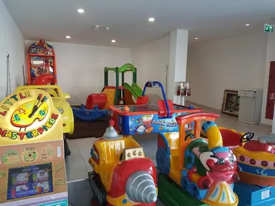 a room with many different types of play equipment at Melini Hotel Suites in Protaras
