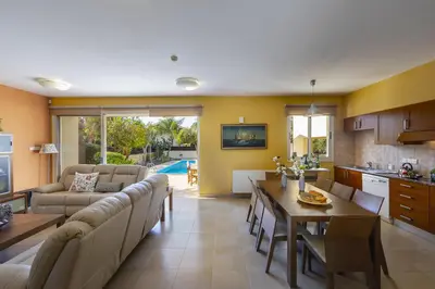 a living room with a couch and a table at Larnaca Villa Anthea 12 in Larnaka