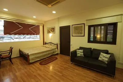 a living room with a couch and a bed at Nicosia Luxury Studio in Nicosia