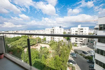 a view of a city from the balcony of a building at Glabur Stays - The Nicosia Elite - Exceptional Top Floor Apartment Nicosia City, Welcomes U!!! in Nicosia