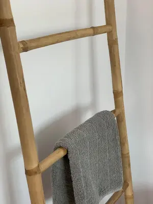 a wooden ladder with a gray towel on it at Glabur Stays - The Nicosia Elite - Exceptional Top Floor Apartment Nicosia City, Welcomes U!!! in Nicosia