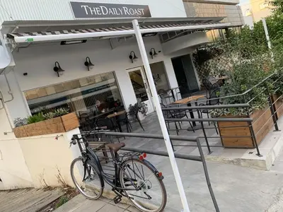 a bike parked in front of a restaurant at Glabur Stays - The Nicosia Elite - Exceptional Top Floor Apartment Nicosia City, Welcomes U!!! in Nicosia