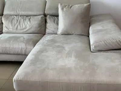 a white couch with two pillows on it at Glabur Stays - The Nicosia Elite - Exceptional Top Floor Apartment Nicosia City, Welcomes U!!! in Nicosia