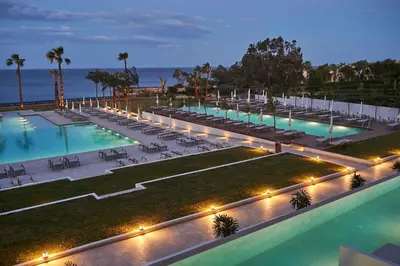 an overhead view of a pool at night at Sunrise Jade - Adults Only in Protaras