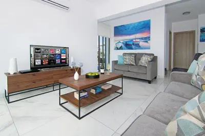 a living room with a tv and a couch at Villa Serena in Protaras