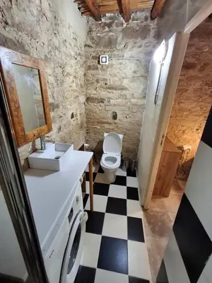 a bathroom with a sink and a toilet at Saint Antonio Maroni in Maroni