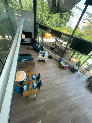 an overhead view of a living room in a building at VILLA CATALEYA Fig Tree Bay Protaras Town Center in Protaras