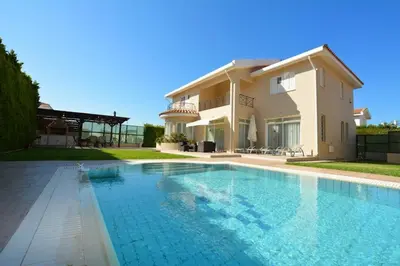 a large swimming pool in front of a house at Villa Daryah Sirina Bay in Protaras