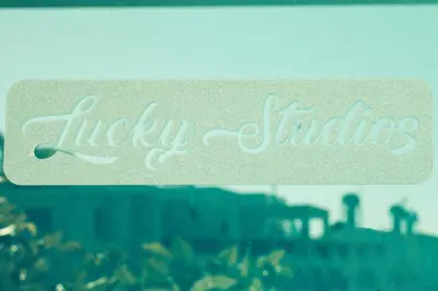a sign with the words turkey stripes on a window at Lucky 2 in Paralimni