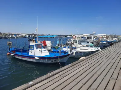 a group of boats are docked at a dock at Sea Krystel 603 in Larnaka