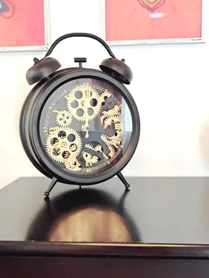 a clock sitting on top of a table at Anasta villa in Protaras