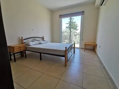 a bedroom with a bed and a window at BG04 Mythical Sands in Paralimni
