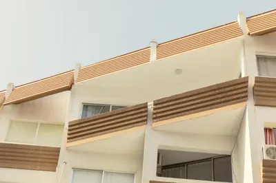 a building with balconies on the side of it at Andriana City Centre Flat in Larnaka