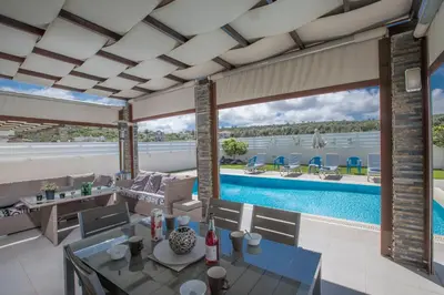 an image of a living room with a pool at Villa Anemoni 8 in Protaras