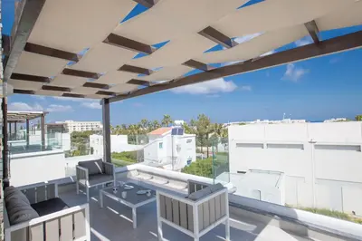 a balcony with a view of a building at Villa Anemoni 8 in Protaras