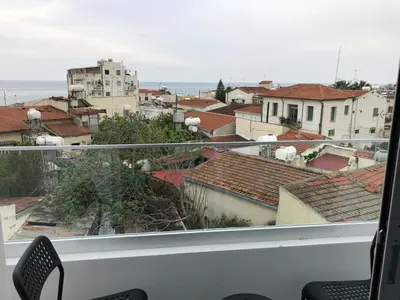 a view of a city from a balcony at White 11 in Larnaka