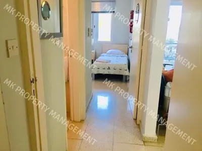 a hallway of a hospital with a bed in a room at Yiallos Village C107 in Larnaka