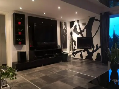 a living room with a flat screen tv on a wall at Fine Designed Flat 302 in Larnaka