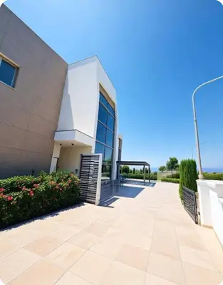 a building with a walkway in front of it at Seaview Luxury Villas Ayia Napa in Ayia Napa