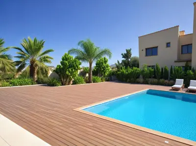 a villa with a swimming pool and a house at Seaview Luxury Villas Ayia Napa in Ayia Napa