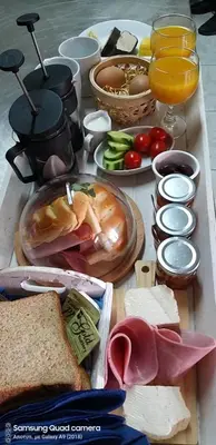 a table topped with lots of different types of food at Ble Mavi - Studio for 2 in Vouni