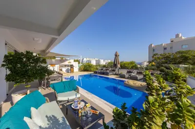an image of a swimming pool on the roof of a building at Fig Tree Bay Residences 6 in Protaras
