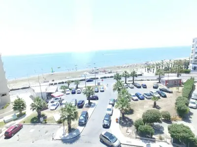 an aerial view of a parking lot next to the beach at ZORBAS No 2 in Larnaka