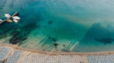 an aerial view of a beach with boats in the water at Sofia's Seaview in Protaras