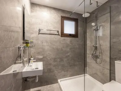 a bathroom with a sink and a shower at Villa Socrates in Protaras