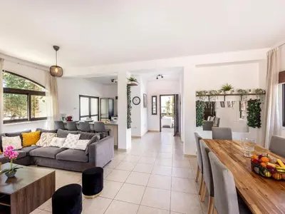 a living room with a couch and a table at Villa Socrates in Protaras