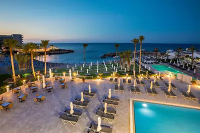 an aerial view of a resort with a swimming pool at Infinity Blu - Designed for Adults by Louis Hotels in Protaras