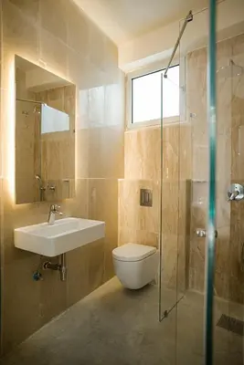 a bathroom with a sink and a toilet and a shower at City Centre Rooms in Limassol