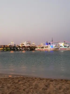 two boats docked at a dock in the water at Villa Sorelle in Protaras