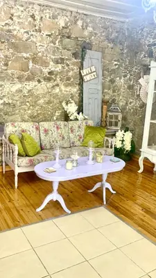 a living room with a couch and a table at Holiday House Prodromos in Prodromos