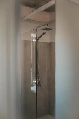 a shower with a glass door in a bathroom at CASAVERO in Voroklini