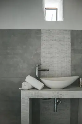 a bathroom with a white sink on a counter at CASAVERO in Voroklini