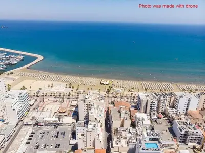 an aerial view of a city next to the ocean at AirBnSea City Centre Side Sea view Apartments in Larnaka