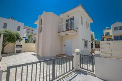 a large white house with a balcony at Protaras View Villa 5 in Protaras