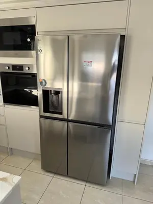 a stainless steel refrigerator in a kitchen at Sunset Villa private complex heated pool in Ayia Napa