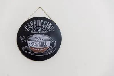 a sign with a cup of coffee on it at EURO CARISSA FLAT 101 in Larnaka
