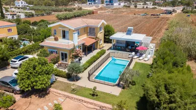 an aerial view of a house with a swimming pool at Ayia Napa Villa Danae in Ayia Napa