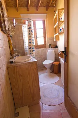 a bathroom with a sink and a toilet at Avli-the courtyard in Nicosia