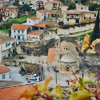 a view of a village with a church and buildings at The Carob Tree Villa - Rustic Luxury Home With Access To Pool And Restaurant in Larnaka