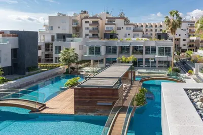 an overhead view of a swimming pool with buildings at Carmencita Studio B14 with pool in Limassol