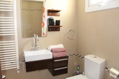 a bathroom with a sink and a toilet at Natali villa in a perfect location in Paralimni