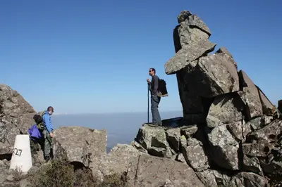 a group of people standing on top of a mountain at Aperanti Agrotourism in Pera Orinis