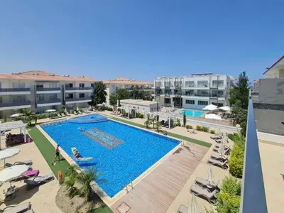 an overhead view of a swimming pool at a hotel at Mythical Sands Resort - Maria in Protaras