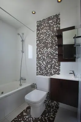 a bathroom with a toilet and a sink and a tub at Protaras Villa Michelle 9 in Protaras